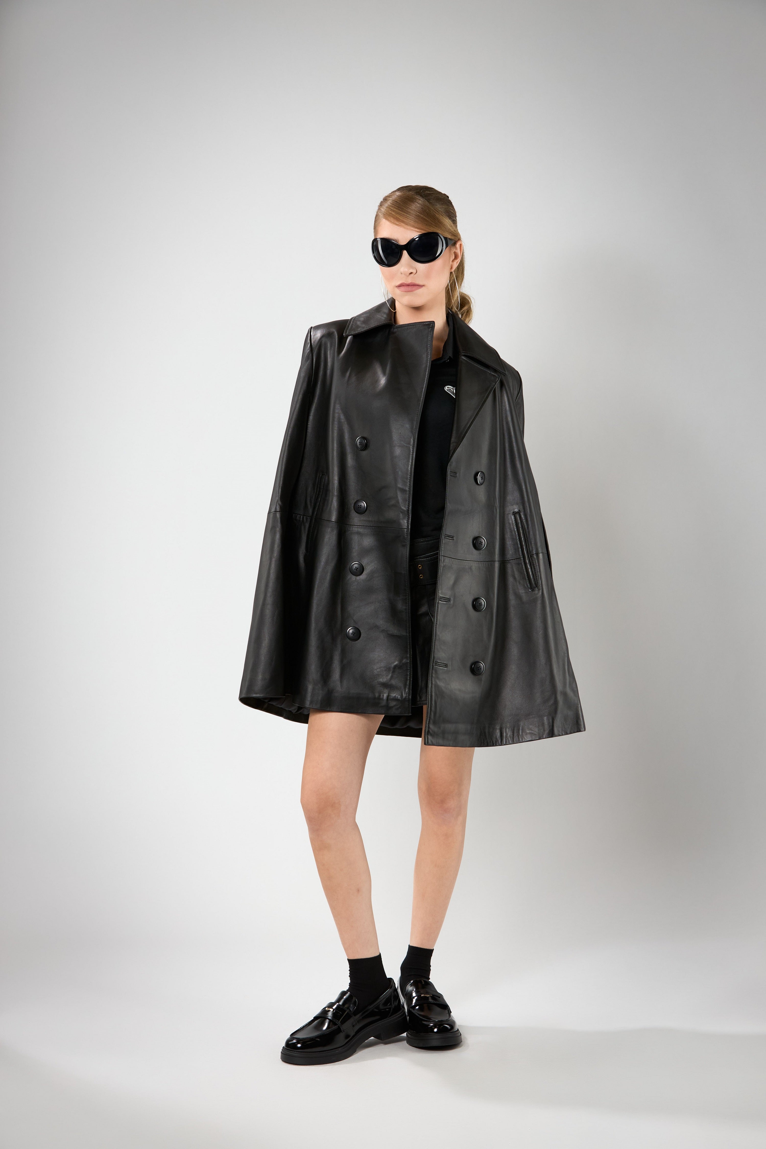 Leather cape with artwork